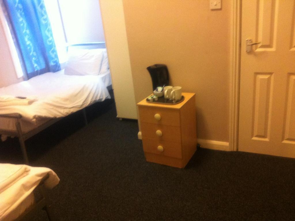 London Olympus Hotel Zimmer foto